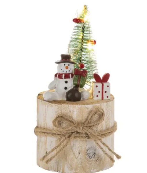 Décor de table, scène d’hiver montée sur une section d’arbre
