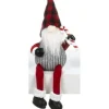 Gnome assis sur tablette