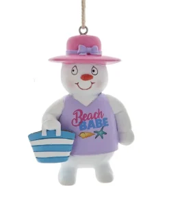 Ornement, dame de neige sur la plage