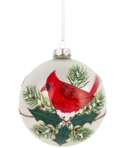 Ornement en verre, cardinal sur une branche de houx